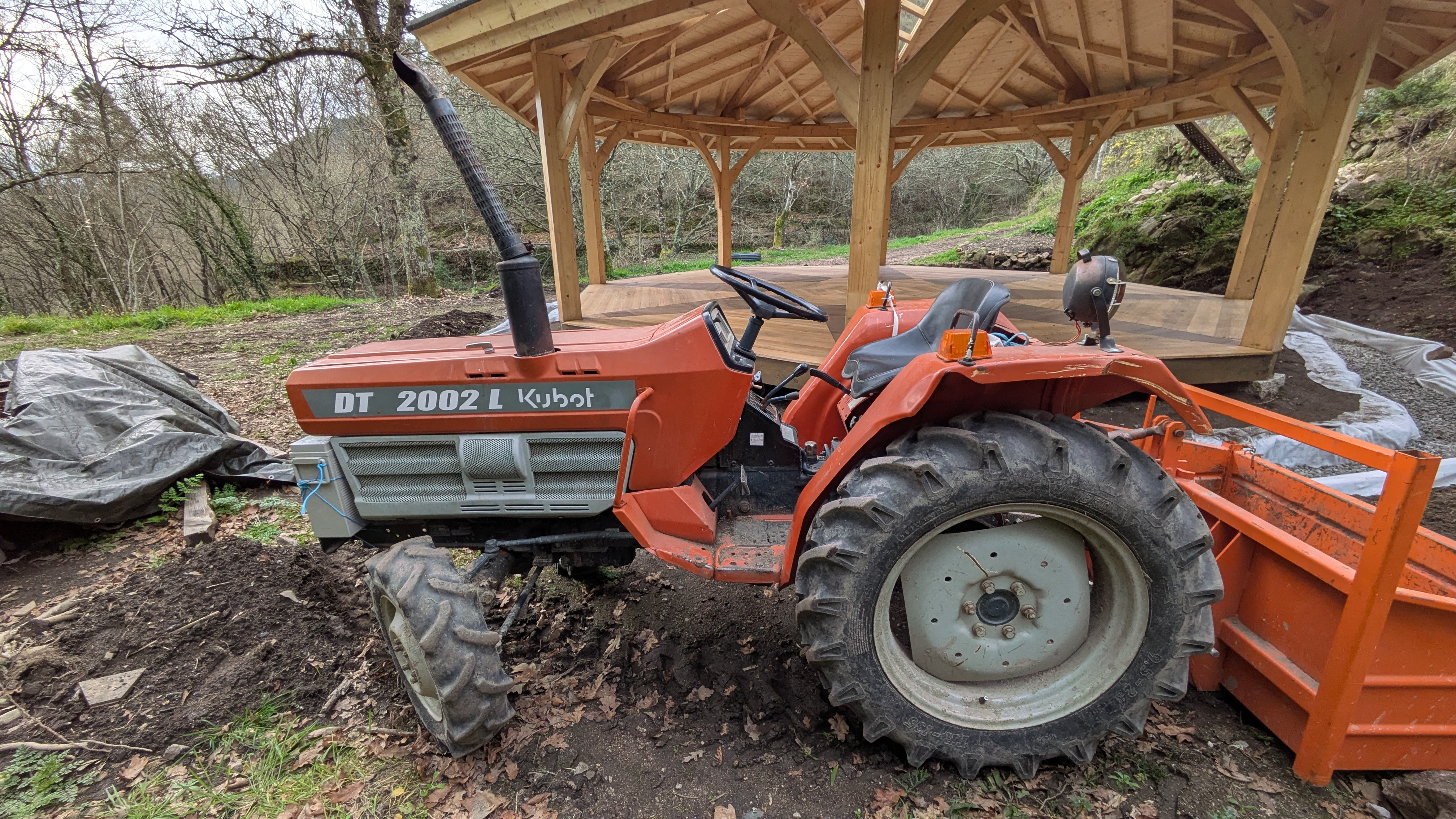 Our Little Orange Kubota at the Temple
